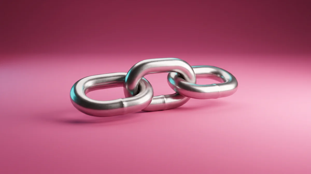 Drie stalen schakels van een ketting die in elkaar grijpen, als beeld bij linkbuilding